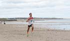 Conrad Franks (Gateshead) finishing the Pier to Pier Race, South Shields to Roker, Sunderland.